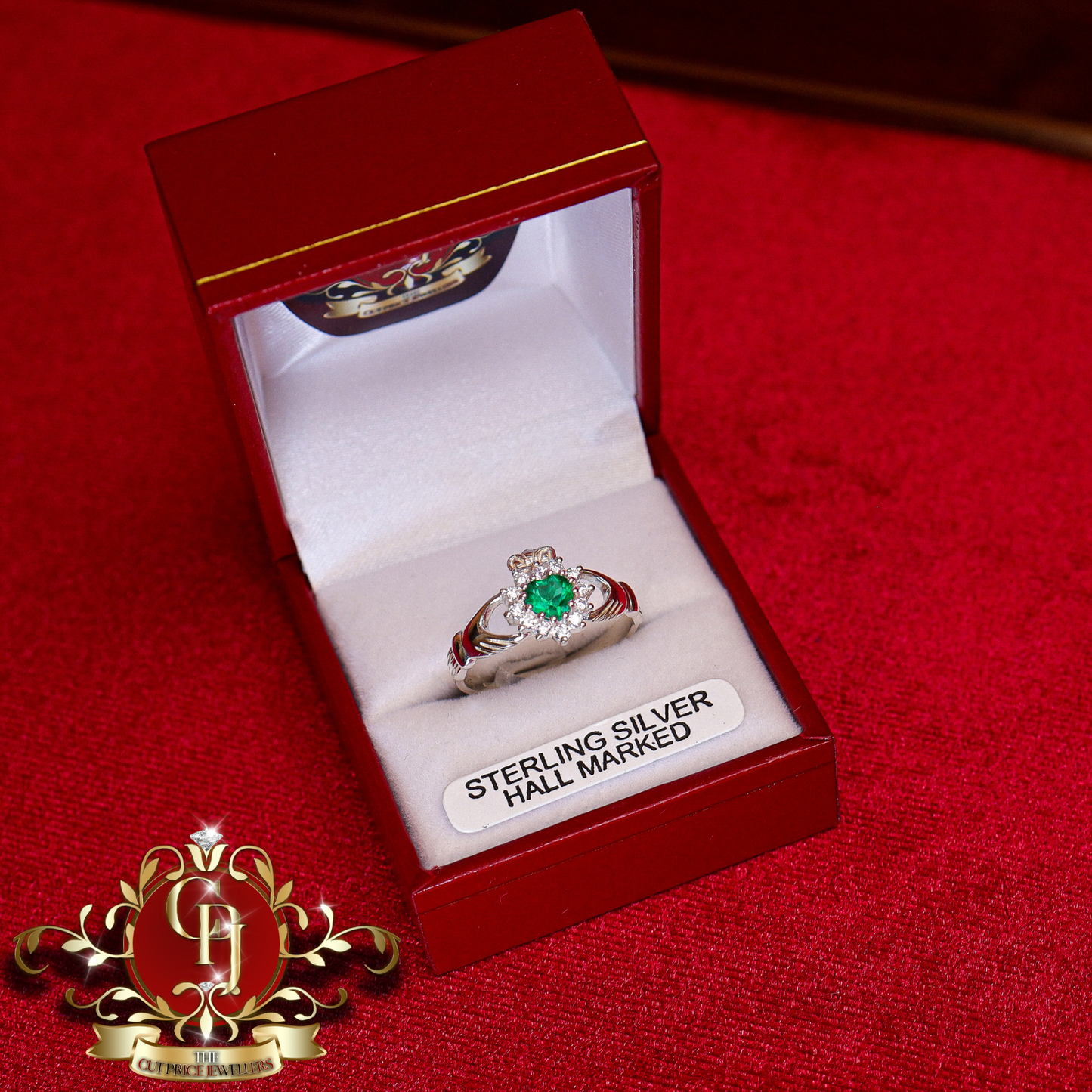 Sterling Silver Claddagh Ring with Green Cubic Zirconia | The Cut Price Jewellers