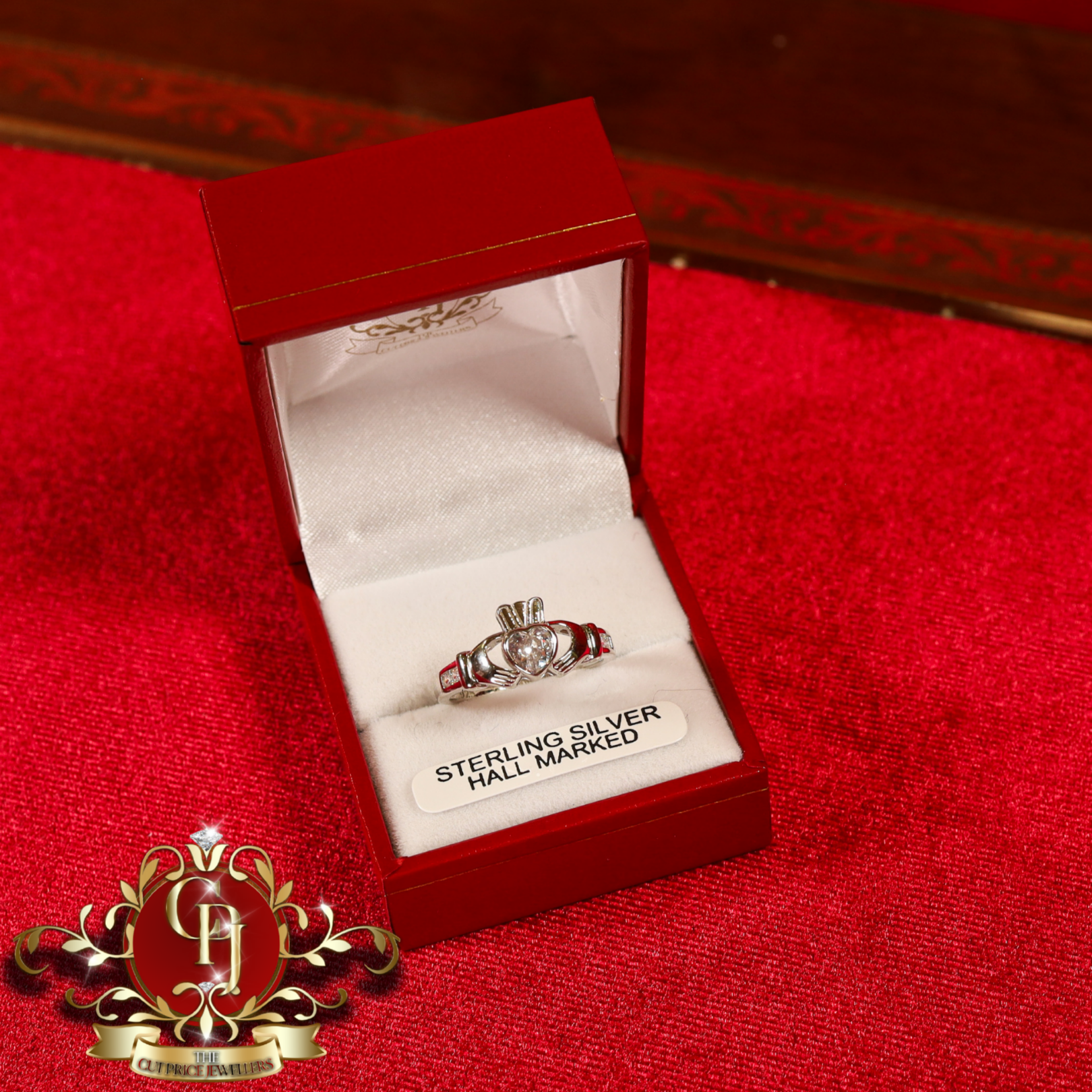 Sterling Silver Claddagh Ring with White Stone
